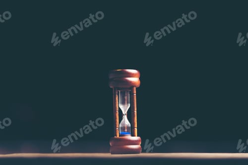 Preview: hourglass on black background