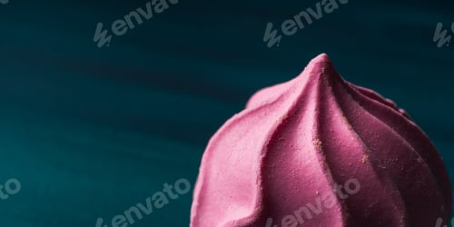 Preview: Pink pastel color meringue on dark green