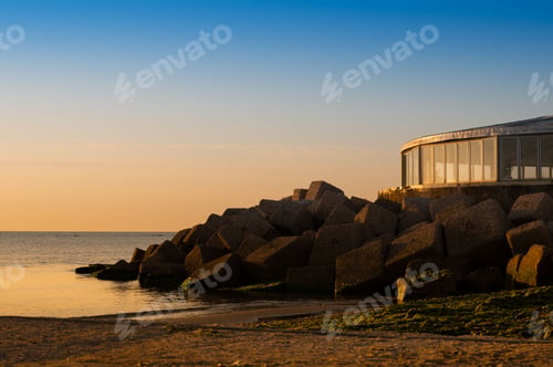 Preview: Glass structure with cliffs at dawn in Pesaro in the Marche region of Italy