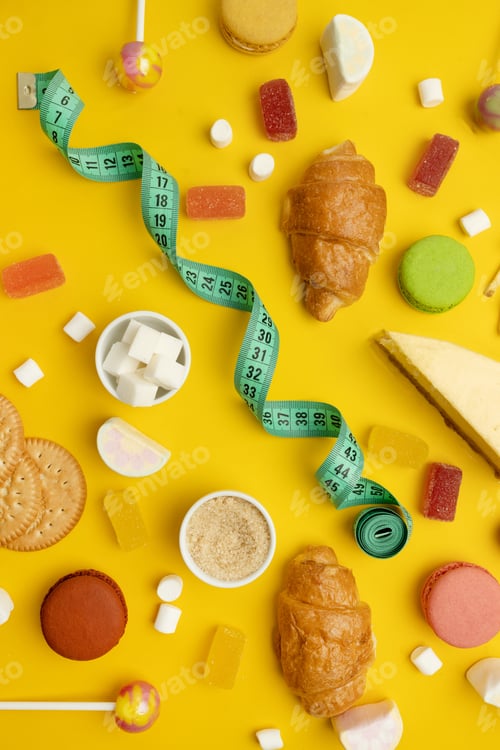 Preview: Colorful candies on a bright yellow background