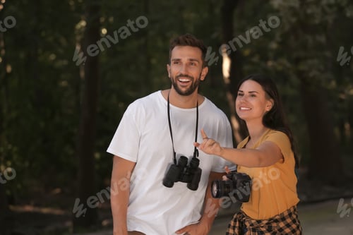 Preview: Lovely couple spending time together in nature reserve
