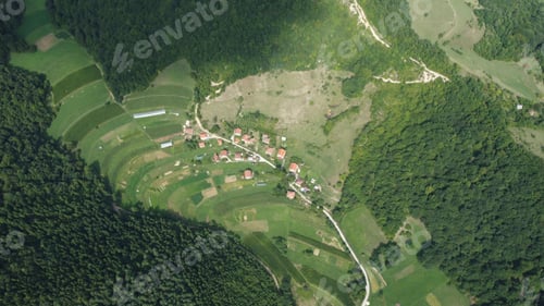 Preview: Aerial top down view of a Bosnian village surrounded by forests and rich vegetation