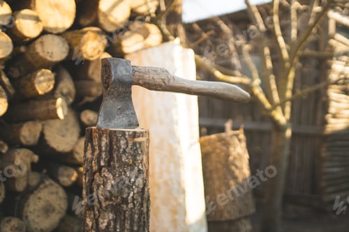 Preview: Ax for cutting firewood. Old vintage ax. Timber harvesting. Rural life. Wood.