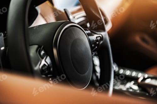 Preview: Black Steering Wheel Closeup