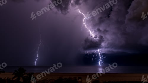 Preview: At night, two bright streaks of lightning hit the ocean of the Gulf Coast of Florida.