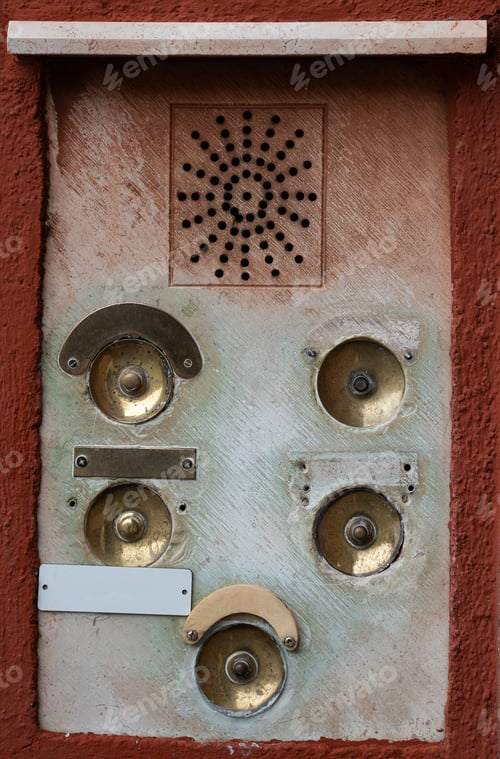 Preview: Rustic intercom panel with multiple bronze buttons
