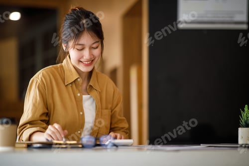 Preview: Young adult happy smiling Hispanic Asian student wearing headphones talking on online chat meeting u