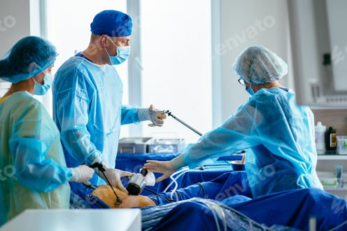 Preview: Surgeons Performing Laparoscopic Surgery in Operating Room
