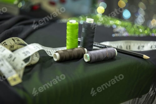 Preview: Tools of sewing. sewing thread rolls, centimetre, scissors, tap measures