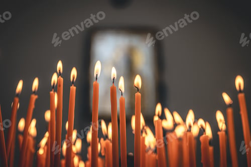 Preview: Close-up, candles in the temple on a blurred background.