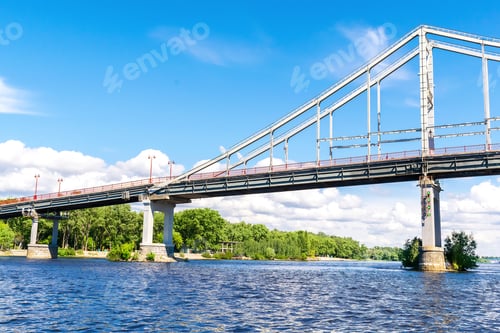 Preview: Scenic nature travel cityscape river Dnipro with blue water and metal pedestrian bridge