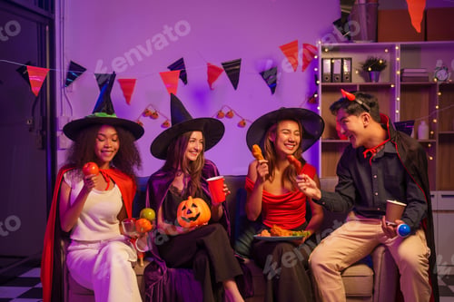 Preview: An African American woman a white woman celebrate coworkers, drinking,having fun smiling together
