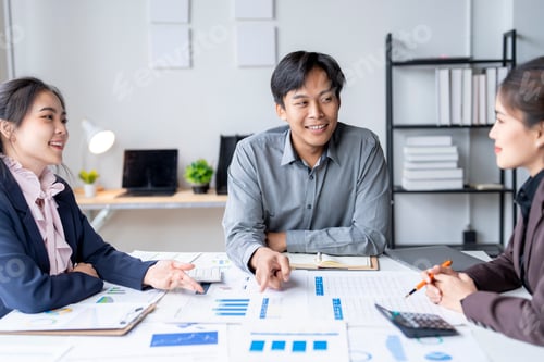 Preview: Young manager explaining marketing strategy during brainstorming meeting