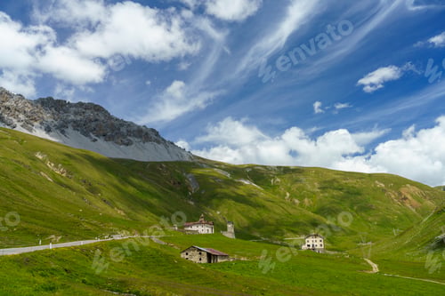Preview: Iridescent cloud over the road to Stelvio pass (Lombardy) at summer