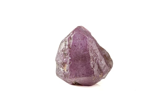 Preview: macro mineral stone alexandrite red - violet in daylight on a white
