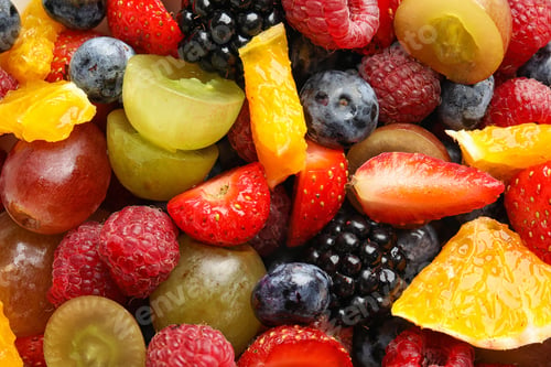 Preview: Fresh tasty fruit salad as background, top view