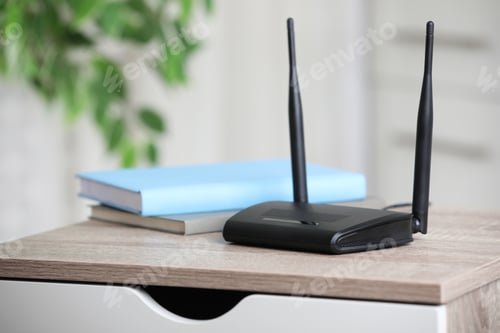 Preview: Modern Wi-Fi router indoors. Space for text