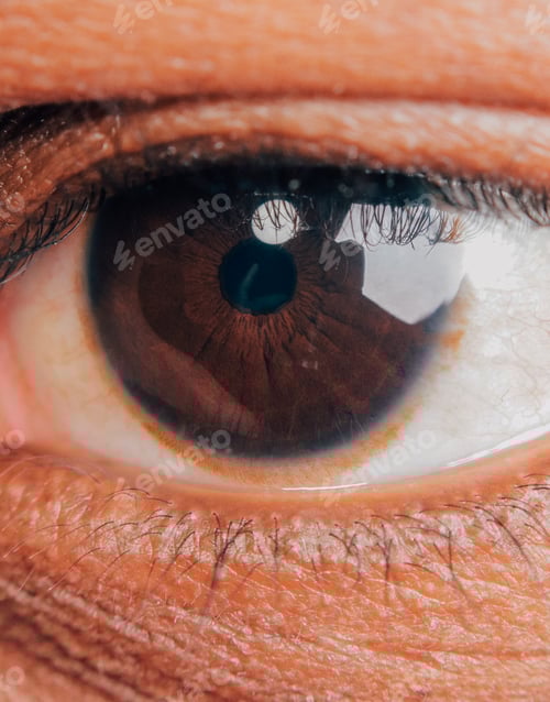 Preview: Close up of African American man’s eye useful for diversity in ophthalmology or optometry imagery
