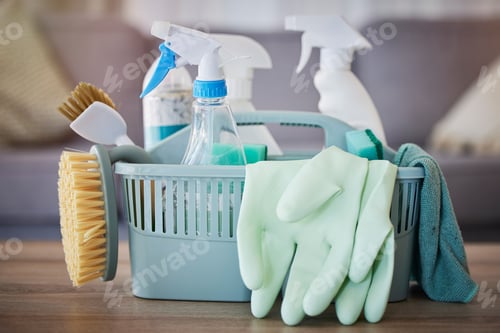 Preview: Cleaning, products and basket on table in home living room for spring cleaning. Hygiene, cleaning s