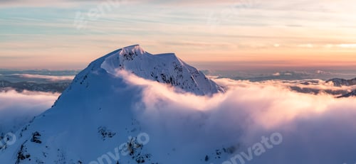 Preview: Snow covered Mountain Peak. Canadian Nature Aerial Background.