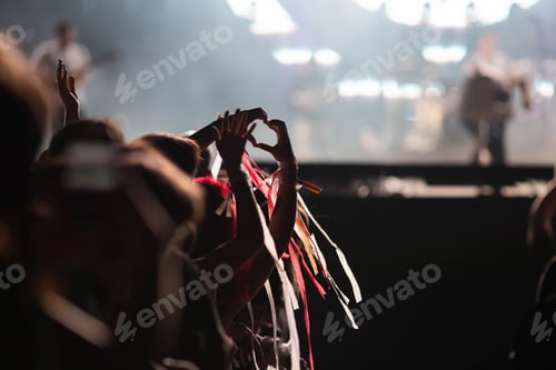 Preview: crowd partying stage lights live concert summer music festival