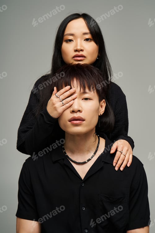 Preview: Stylish couple sharing a moment of love and connection during an enchanting urban photoshoot