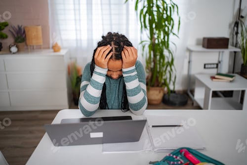 Preview: Frustrated student having headache during online studying