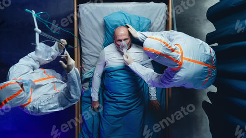 Preview: Top view of doctors and covid-19 patient with oxygen mask in bed in hospital, coronavirus concept.