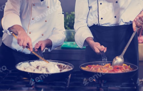 Preview: team cooks and chefs preparing meals