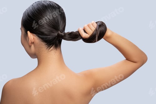 Preview: Close up of Asian girl that demonstrating her strong hair