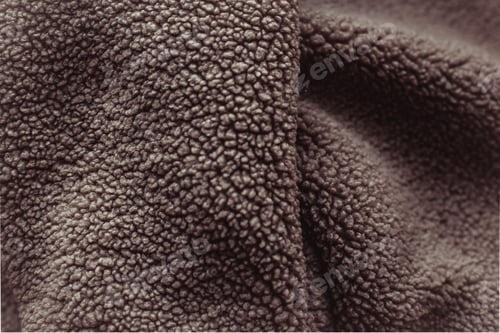 Preview: Color of the Year 2025 Mocha Mousse color. Chocolate or Brown Background.
