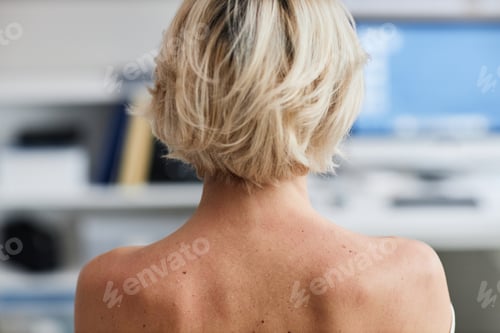 Preview: Caucasian Middle Aged Woman Attending Dermatology Consultation in Clinic
