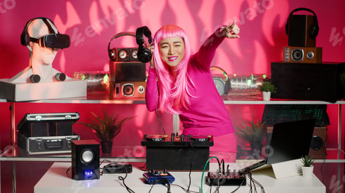 Preview: Smiling artist listening remix into headphones