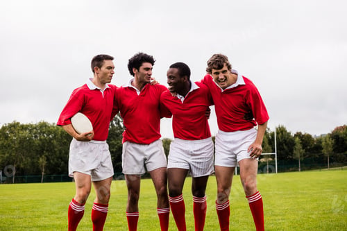 Preview: Rugby Players Smiling With Arms Around At The Park