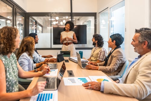Preview: Diverse business team collaborating during office meeting