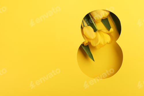 Preview: 8 March greeting card. Paper cut Eight made of yellow background and fresh spring flowers bouquet of