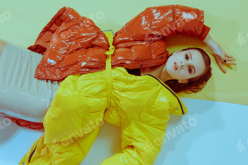 Preview: Art Fashion Portrait Of A Beautiful Girl With Makeup In A Colored Jacket In The Studio
