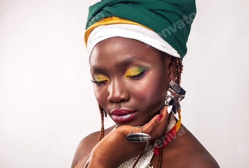 Preview: Studio portrait of African black woman with vibrant make up.
