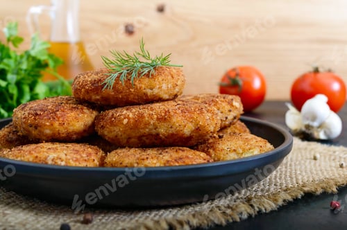 Preview: Juicy homemade cutlets (beef, pork, chicken) on a black background.