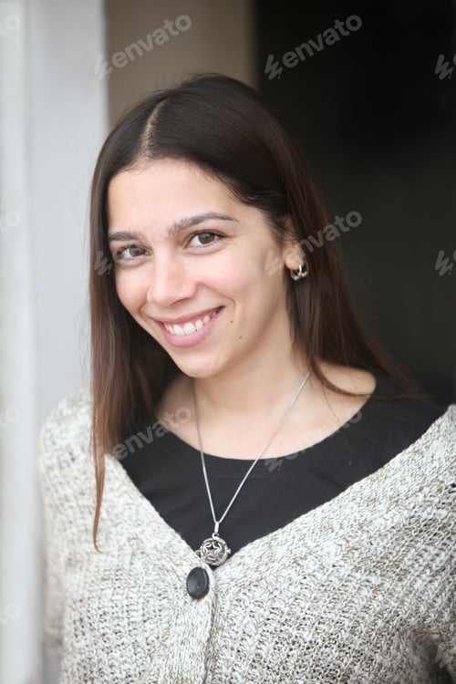 Preview: Portrait of a Young Latin American Woman Smiling at Camera