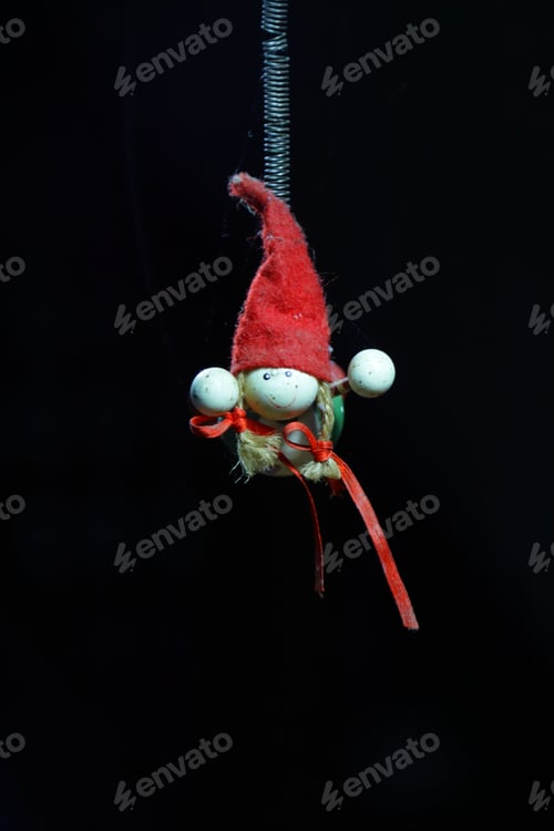 Preview: Vertical shot of a toy hanging from the ceiling