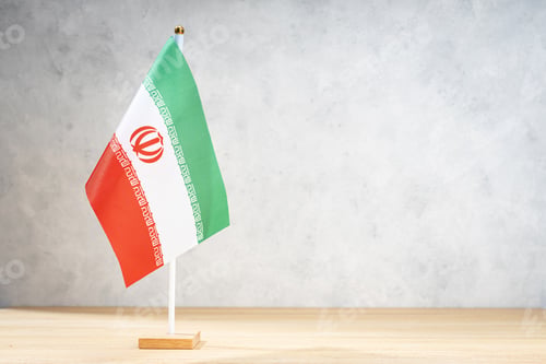 Preview: Iran table flag on white textured wall