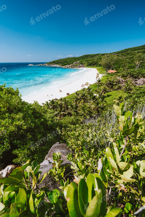 Preview: Grand Anse beach at La Digue island in Seychelles. White sandy beach with blue ocean lagoon and