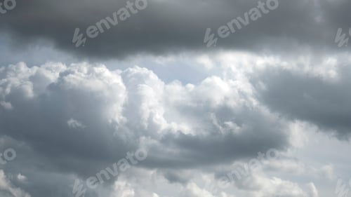 Preview: Dark storm moody heavy dramatic fluffy cloudy sky. Bad weather thunderstorm.