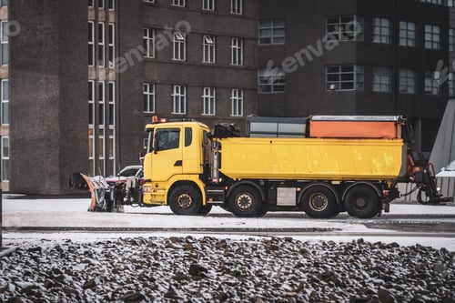 Preview: A photo of a street snowplow in downtown Reykjavik.