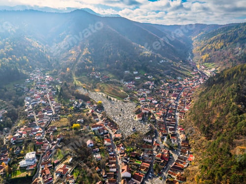 Preview: Aerial drone view of autumn Brasov city with mountains