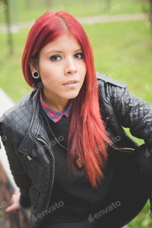 Preview: young beautiful red hair venezuelan woman lifestyle listening music