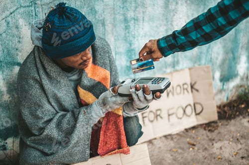 Preview: Beggars sitting under the overpass with a credit card and credit card swipe machine