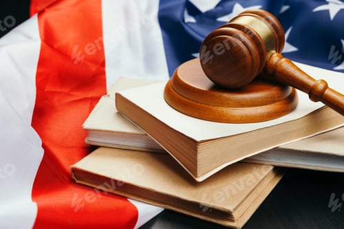Preview: Judge gavel on the background of the flag united states of America