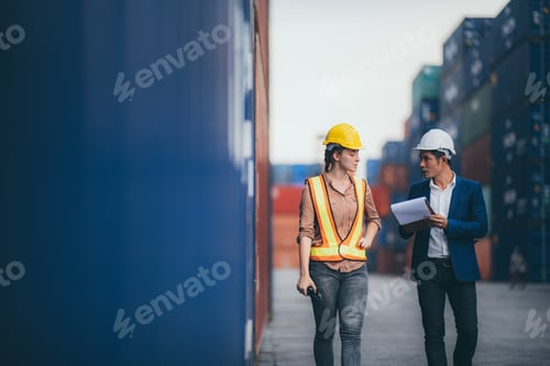 Preview: Business executives And engineers visiting industrial plants warehouses